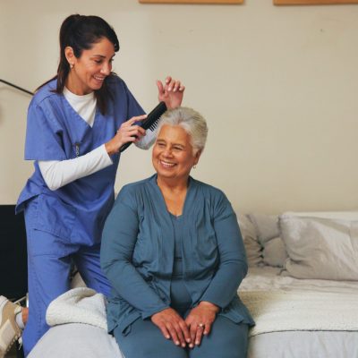 tcar-img-nurse-brush-and-senior-patient-with-hairstyle-for-2025-01-15-17-58-57-utc Nurse, brush and senior patient with hairstyle for self care, grooming or morning routine at assist.